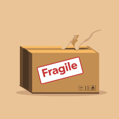 Hand placing fragile sticker on cardboard shipping box