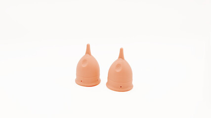 Two Menstrual Cups on White Background Isolated Product Shot