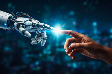 Cyborg and human hand connection with glowing blue electrical spark