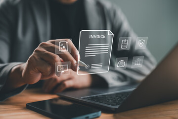 E-Invoice and online digital statements concept. Businessman working with invoice, financial icons, billing, payment processing, scheduling, tax management, modern e-invoicing, financial technology.