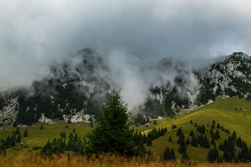 Summer scenery in the Transylvanian Alps with spectacular imagery and dramatic storm clouds, in July and August