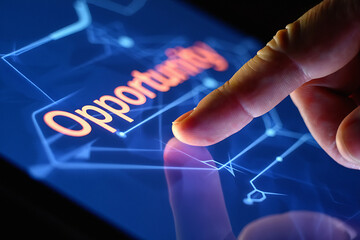 Finger touching screen with Opportunity text and futuristic network background