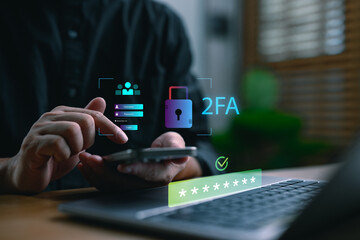 User enabling two-factor authentication (2FA) with smartphone and laptop. Concept of cybersecurity, secure login, password protection, data privacy, and identity verification for online safety.