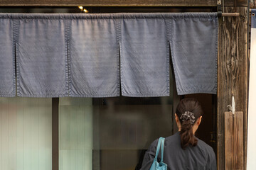 The curtain-like fabric that hangs in front of traditional Japanese restaurants and shops not only serves as a signboard, but holds a larger meaning,