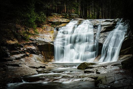 waterfall in the forest - Powered by Adobe