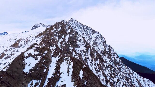Aerial drone view of Moon Peak (Mun Peak) in the Dhauladhar range, Himachal Pradesh. Captured from above