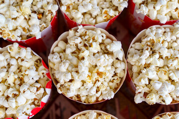 Popcorn Buckets in Striped Red and White Containers
