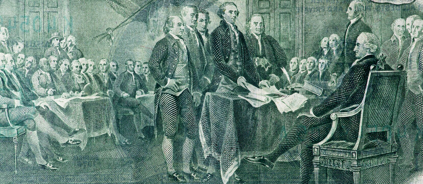 Detail of a dollar bill with the image of the Declaration of Independence