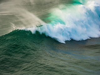 Powerful ocean wave crashing breaking with immense energy in Nazar&eacute;