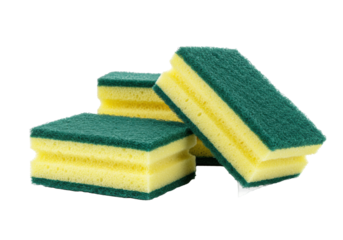 Three new yellow and green cleaning sponges isolated on a transparent background in a detailed macro shot. Concept of domestic cleaning and professional hygiene