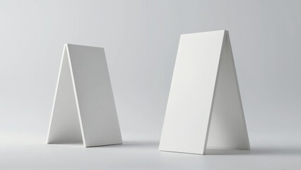 White A-frame stands on neutral background