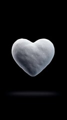 Heart floating in space scene concept, Heart-shaped stone symbolizing love and affection on a dark background.