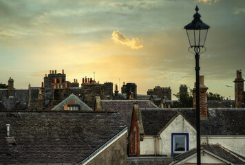 Birds and antennas on the rooftops of residential buildings in  St. Andrews, Fife, Scotland