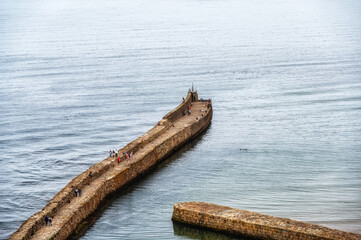  Located in St Andrews, the Harbour Pier extends along the coastline, providing dramatic views of the North Sea and the town.