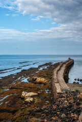  Located in St Andrews, the Harbour Pier extends along the coastline, providing dramatic views of the North Sea and the town.