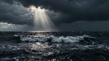 Stormy sea with rain and sunlight breaking through clouds