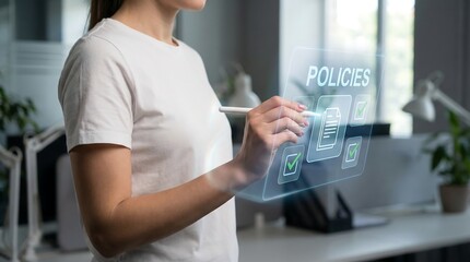 a woman interacts with a glowing digital interface displaying policies and checkmark icons suggesting compliance regulation and data security in a modern office