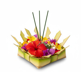 Traditional Thai Loy Krathong Basket with Tropical Flowers and Incense