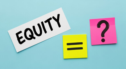 Conceptual image represents equity using a sticky note with the word equity, an equal symbol, and a question mark, set against a pastel blue backdrop. The image is clean and well-lit.