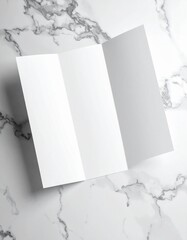 Blank Tri Fold Brochure Mockup on Marble Background.