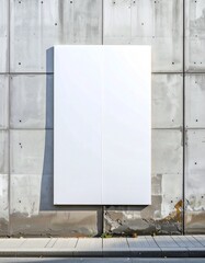 Blank White Poster Displayed on Textured Concrete Wall.