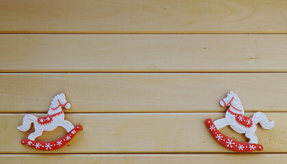 Rocking Horse Cookies Festive Flatlay. Wooden Background Minimal Red White