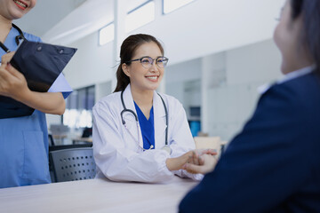 Doctors with  woman patient for medical support, talking for healthcare.