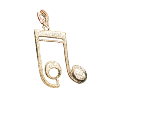 Gleaming musical note pendant on a black background
