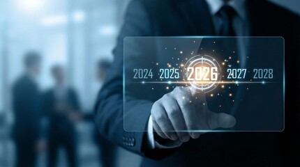 A business professional is interacting with a transparent digital display showing projected years from 2024 to 2028 symbolizing future planning and technological integration