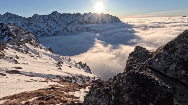 High mountains picturesque timelapse with panoramic view of the moving sea of clouds - Tatra Mountains, Szpiglasowy Wierch (Peak)