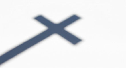 Obraz premium Minimalist religious background with a soft cross shadow for Easter design