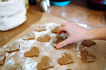 making heart-shaped gingerbread cookies