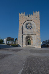 Traditional rural stone house with wooden gallery and slate roof
