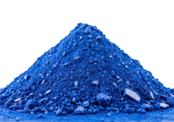 low-angle macro photo of pulverized deep azure blue mineral powder with sharp angular crystalline chunks against a brilliant white cyclorama background, high textural fidelity. concept of