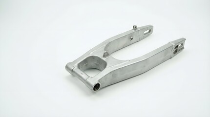 Metal motorcycle frame component on white background