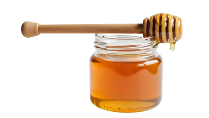 Honey in a jar with dipper