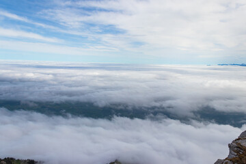 View over clouds from Stockhorn mountain in Bernese Oberland, Switzerland