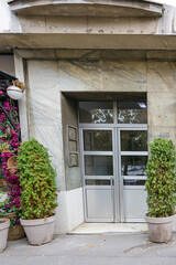 Metal and glass entrance door on modern building exterior