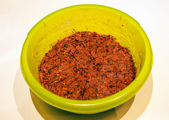Vegan minced meat a plant based alternative to traditional ground meat inside plastic bowl