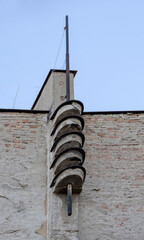 Closed spiral stairs on modern building edge exterior