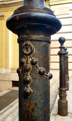 Old metal lantern on the street in Prague, Czech Republic. Architectural detail.