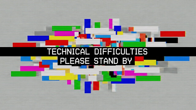 Vintage television screen displaying bright, colorful static interference patterns and a prominent black banner with white text indicating technical difficulties or broadcast interruption requiring im