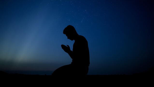 Silhouette Making Dua at Taraweeh Under Starry Twilight Sky