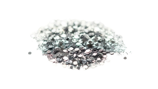 Pile of silver glitter sequins isolated PNG, shiny metallic confetti for festive decoration and craft projects on transparent background