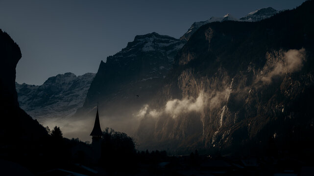 time lapse of clouds over the mountains - Powered by Adobe