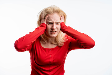 The young emotional angry woman screaming on white studio background