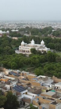 Suburbs of the city around the famous Gulzaar Palace of Bahawalpur, Pakistan. Vertical and Aerial Footage