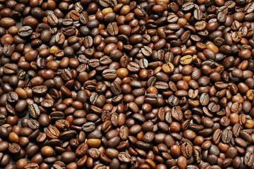 Fototapeta premium Close-Up of Roasted Coffee Beans Texture Background