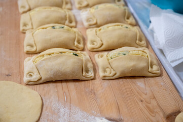 Traditional Cypriot Flaouna, a delicious Greek Easter Cheese Bread. Flaounes are traditionally prepared for Easter by Orthodox Cypriots.