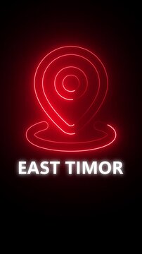 Red Neon Location Pin Icon with East Timor Text on Black Background Keywords: East Timor, location pin, neon, red, icon, symbol, map, navigation, destination, travel, country, geography, place